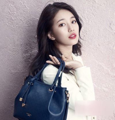 2018女生知性风慵懒中长卷发发型！