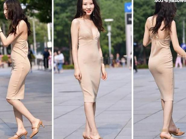 美女身穿肉色深V吊带连衣裙，散发出迷人的女人味！