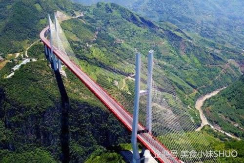  我国@相当于200层楼高，在我国云贵交界处，堪称世界上最高大桥