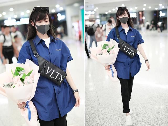 张天爱一改往日御姐风，现身机场剪了个小刘海，简直像换了张脸