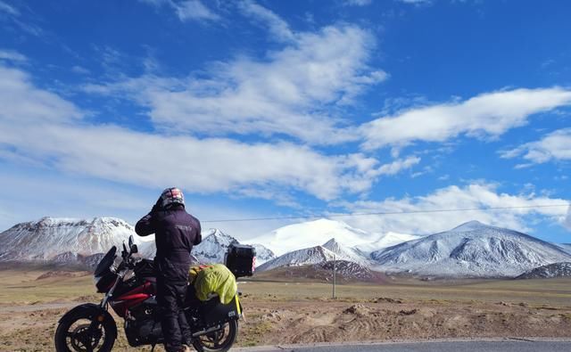 环游中国需要多少钱?开摩托车环游中国的小情侣来回答你