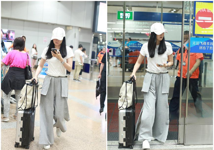 44岁王艳穿开叉阔腿裤亮相，高雅贵气新风尚，网友：像20岁少女