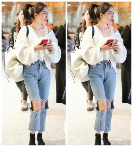 杨幂竟然把家里的烂裤子也穿了出来，网友：好像给她剪掉一块！