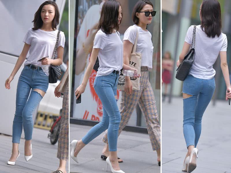 前凸后翘迷人身材的颜值小姐姐，穿一件紧身牛仔裤，真的不烂不美