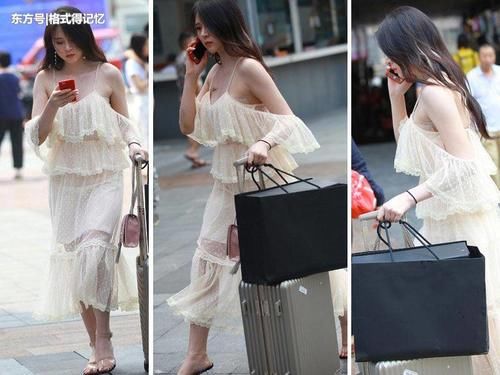 这位拖着行李箱的美女是空姐吗？不仅颜值高，而且身材也好！