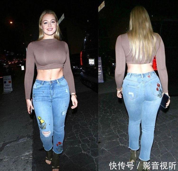 街拍：紧身牛仔裤惬意舒适的搭配，尽显小姐姐大长腿，青春时尚感