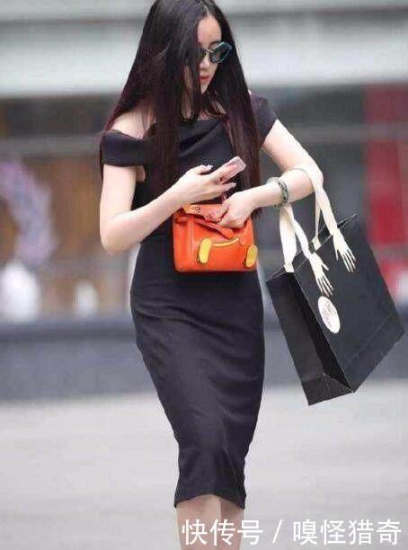 街拍：青春靓丽的小姐姐，短裤增添时髦风韵，窈窕长腿秀出魅力