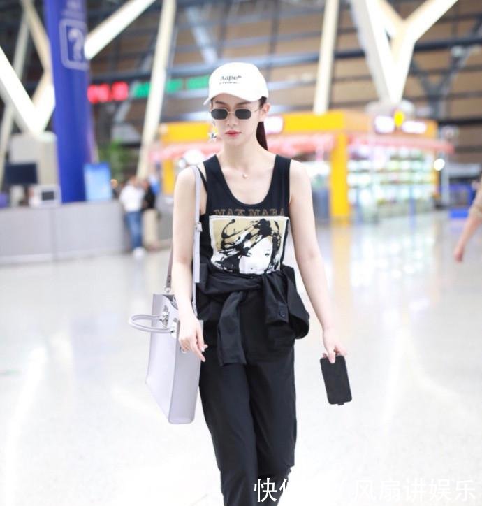 戚薇夫妻俩一同现身机场, 这回李承铉穿得可比戚薇时髦多了!