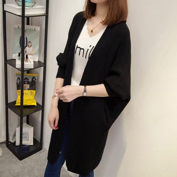 膝盖怕受凉的女人有福了，穿上这针织外套!保暖还美嫩