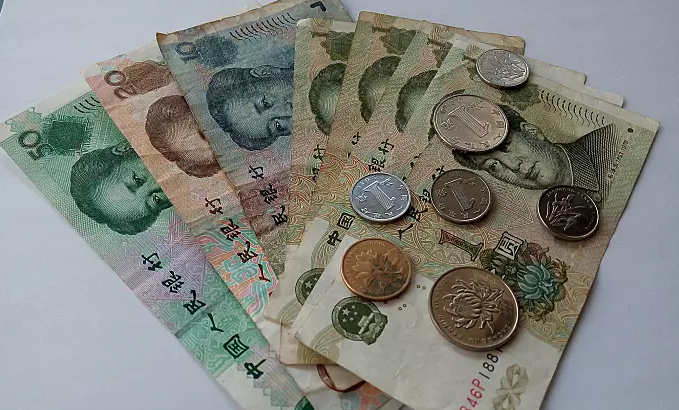 中美贸易战如火如荼 人民币为何贬值? 贸易战变成货币战?