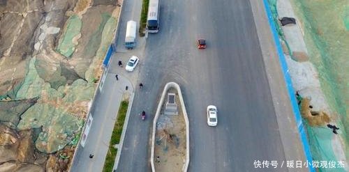  「马路」中国最霸气钉子户，立在马路中央占了道路三分之一，就