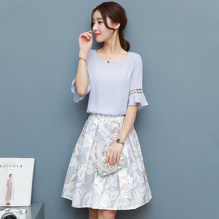 有肚子的女人要穿“宽”点，试试下图高级女裙，胖人穿出时髦感