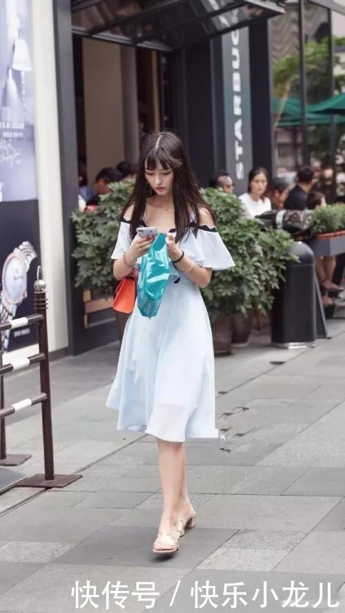 『小肚子』街拍:身材匀称高挑的妹子,搭配一双铆钉的尖头高跟鞋才能显得非常时尚