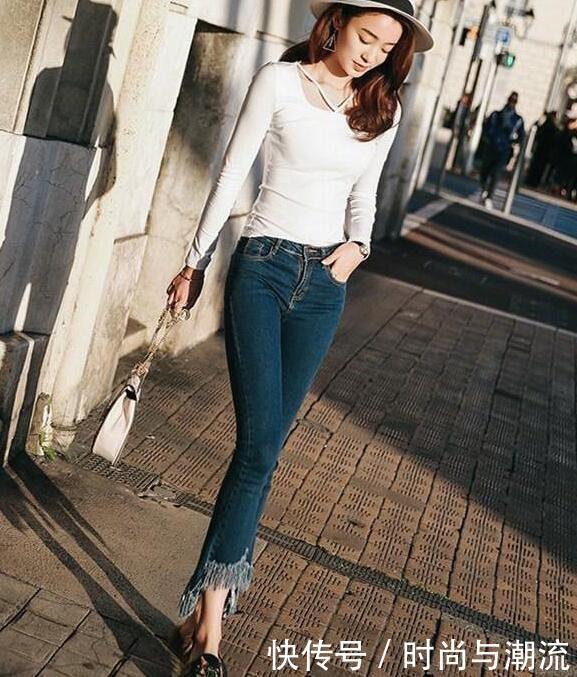 非常简单的紧身牛仔裤,衬托出女人十足的魅力!