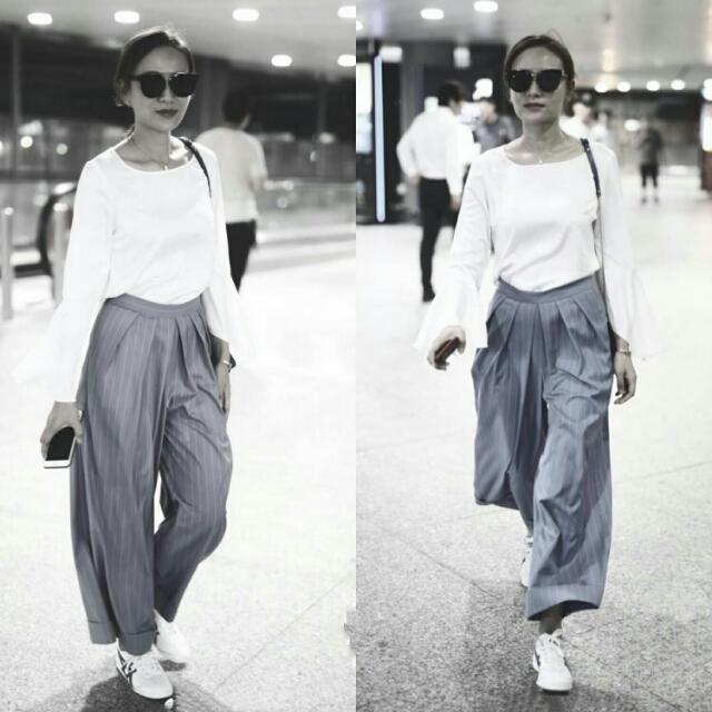 叶一茜机场终于换风格了,穿百褶阔腿裤气场开挂,早该这样穿了!