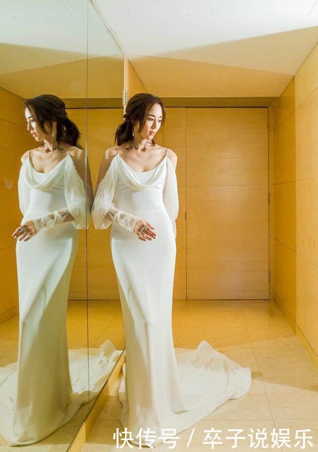 张钧甯气质可真好，穿菱格裙出席活动，就算未修图照也很美！