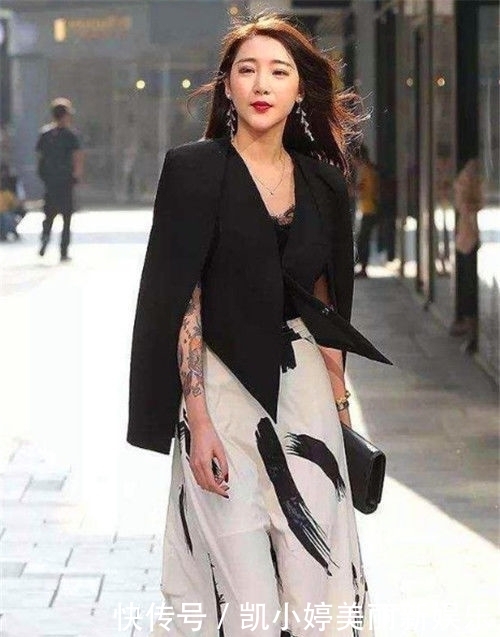  气质：街拍：气质迷人的小姐姐，展现高挑身段，是别样的风采