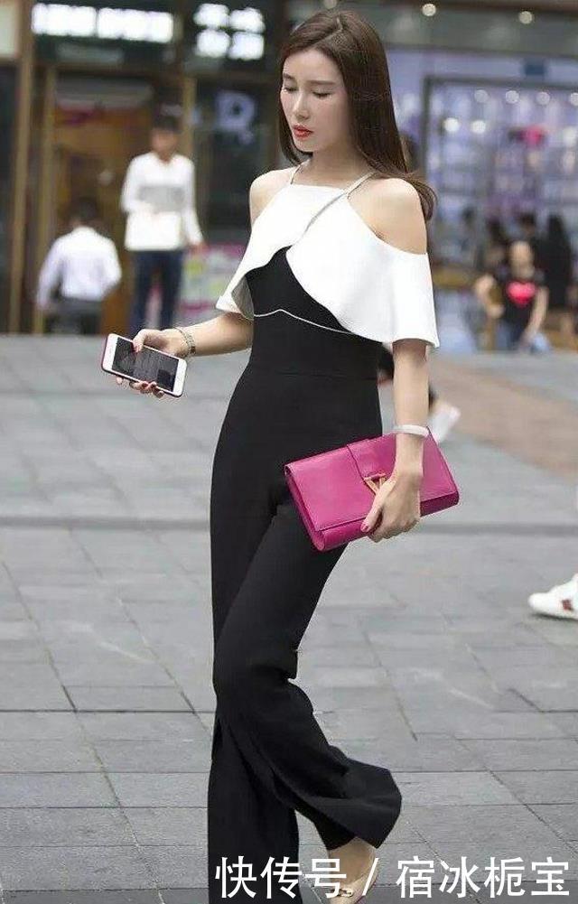 美女|路人街拍:靓女牛仔裤搭配吊带背心,带有几分时尚魅力