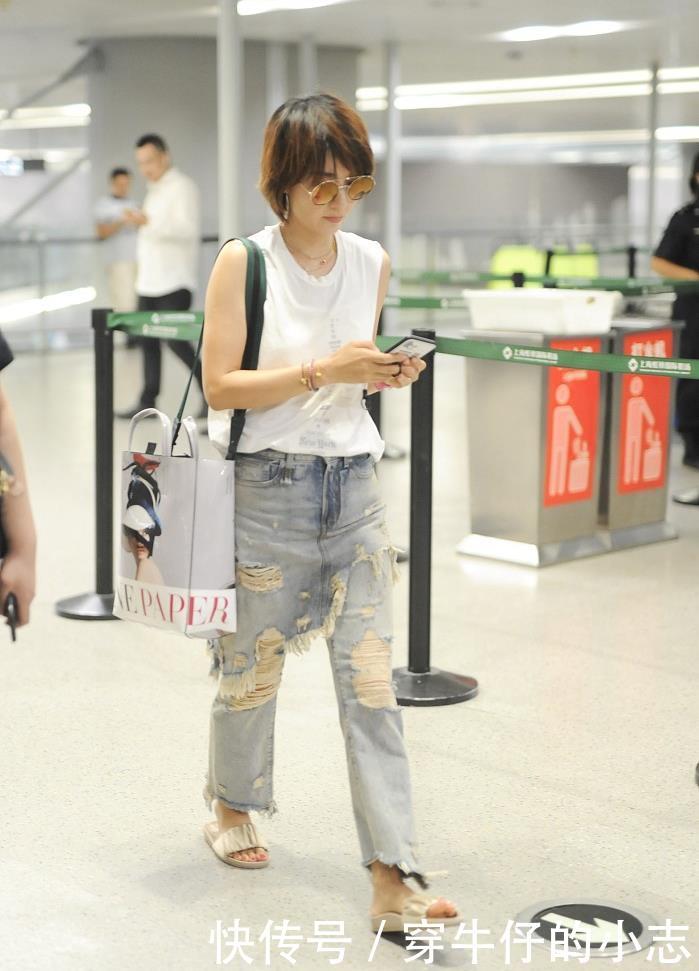 马伊琍又穿破洞裤走机场,这回还在外面套裙子,潮得不行啊
