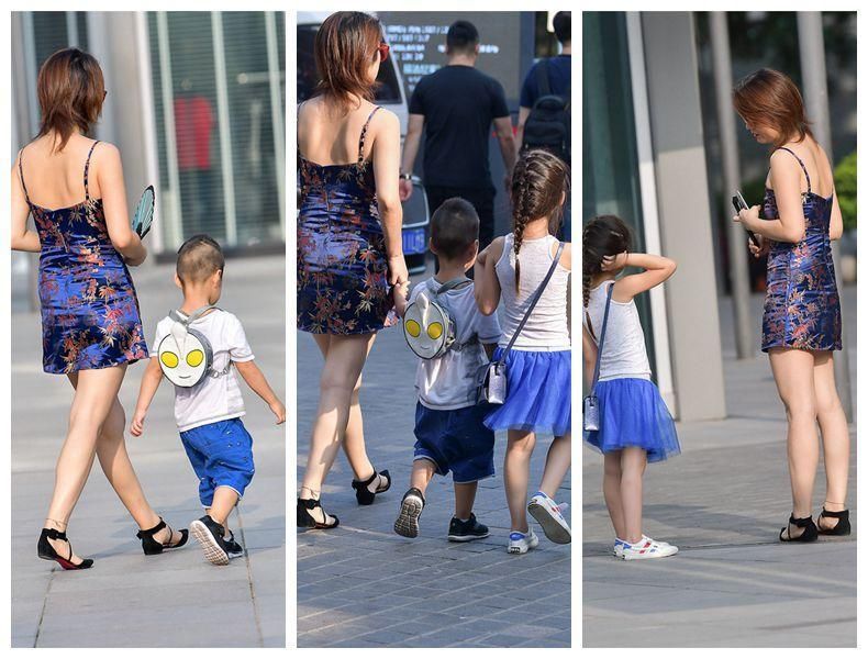 街拍:一儿一女一枝花，时尚漂亮小辣妈