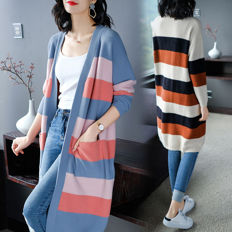 会穿的女人最喜欢用长外套配打底裤，这样的效果，一个比一个美