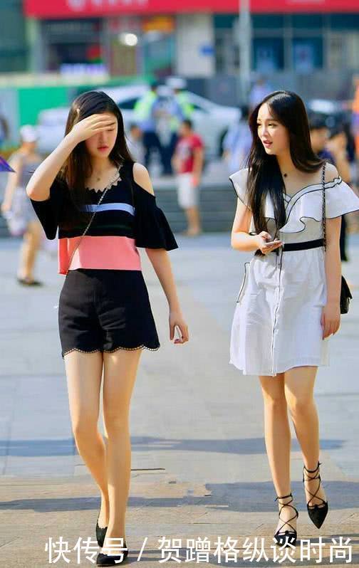 路人街拍,黑色蕾的丝款式配上吊带背心,散发出一股优雅女人味!