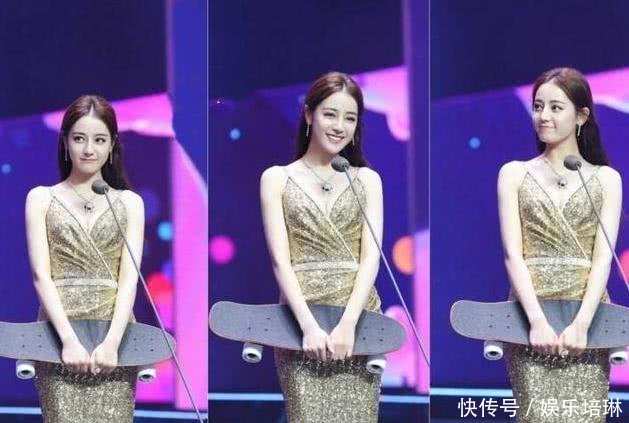 迪丽热巴穿金色深V鱼尾裙像极美人鱼，但是败在了一个细节