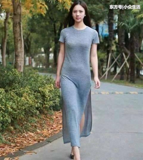 街拍:薄纱长裙有韵味的小姐姐,风一吹腰上的小肚肚出来了