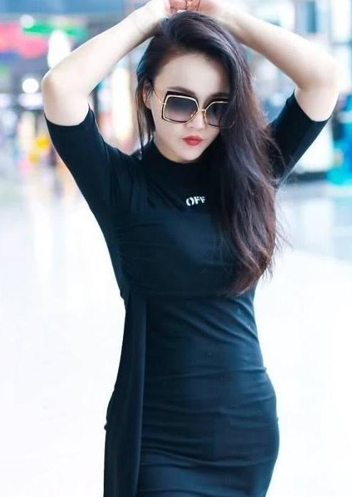 冉莹颖机场秀出新高度，紧身长裙肉肉都被勒出印来