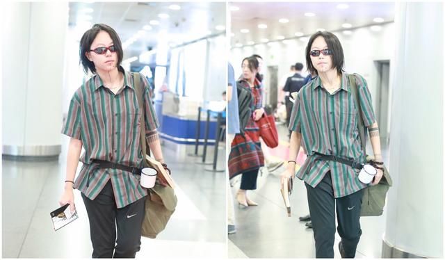 这种时尚你懂吗？窦靖童机场腰间挂水杯超个性，竟如此接地气