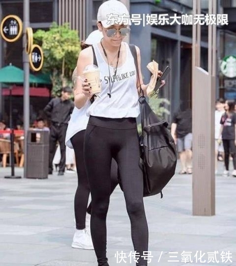  『美女』街拍：楚楚动人的美女，一件黑色背心配牛仔短裤，青春活力气质范