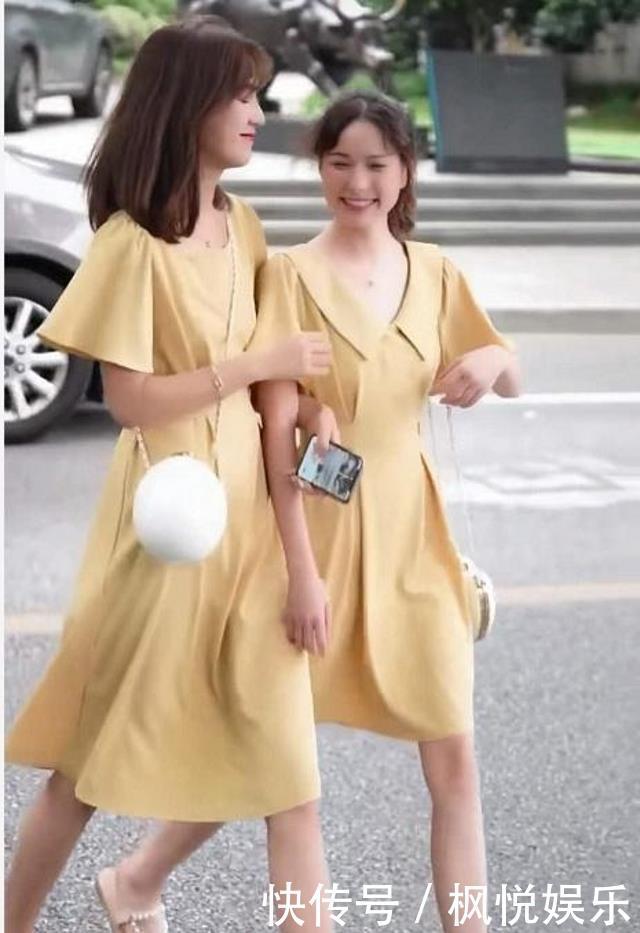 女人|路人街拍:美女穿v领粉红色连衣裙,女人味十足