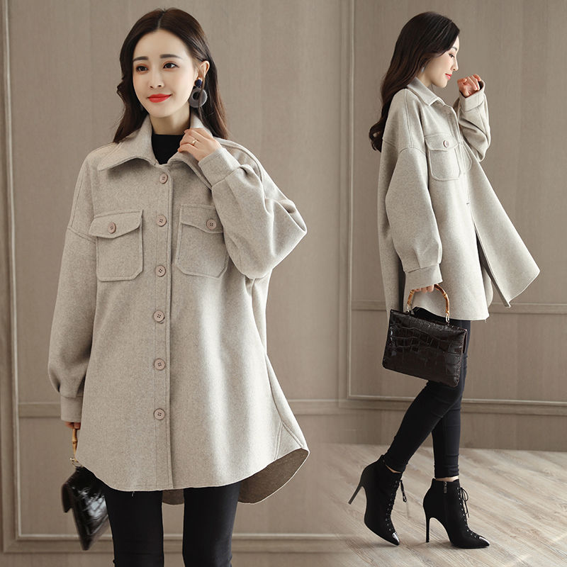 今年流行一款高档大衣:呢外套,搭配黑色打底裤,简直漂亮不像话