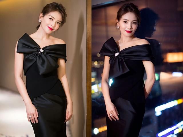 40岁刘涛真疯狂，这么紧的黑裙也要硬穿，一走路时就尴尬了！