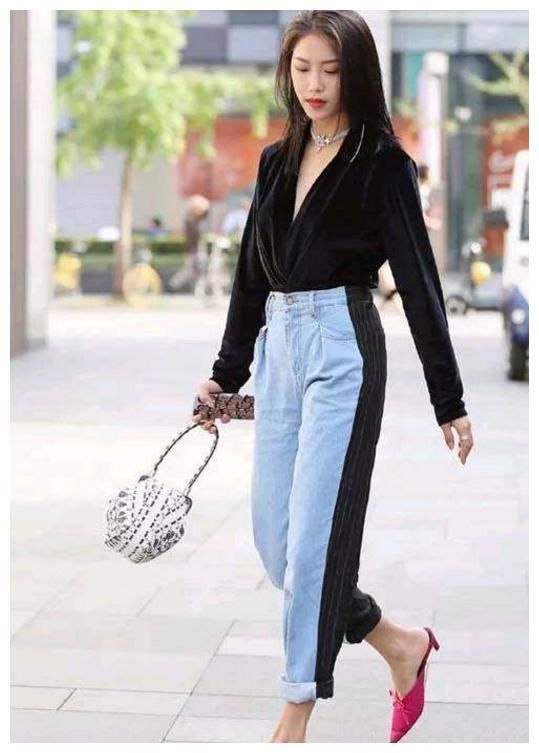 街拍：冷艳高贵的美女，身材高挑，展现出十足的女人味