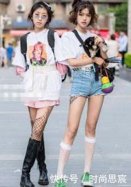 街拍小姐姐魔鬼身材，搭配短裙让你知道另类的时尚！