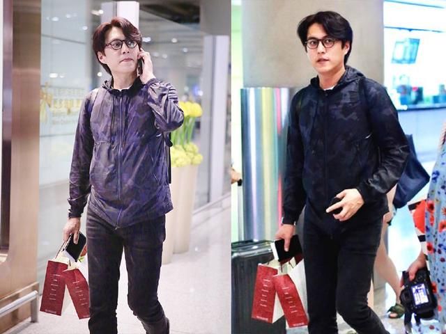 41岁靳东现身，却穿了件粉衬衫，网友：老干部也要俏？