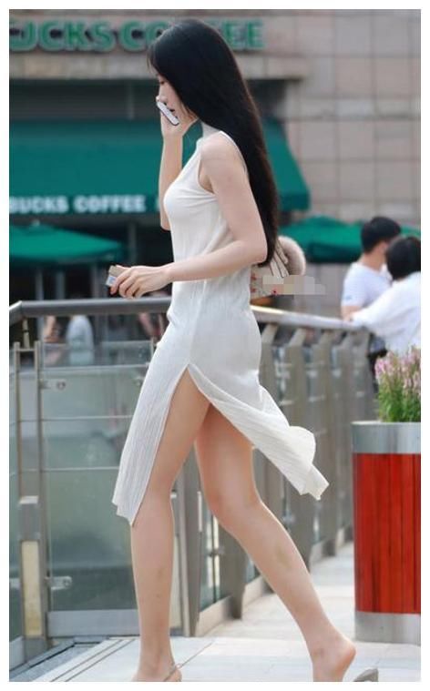 街拍：冷艳高贵的美女，身材高挑，展现出十足的女人味