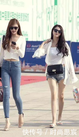 街拍小姐姐魔鬼身材，搭配短裙让你知道另类的时尚！