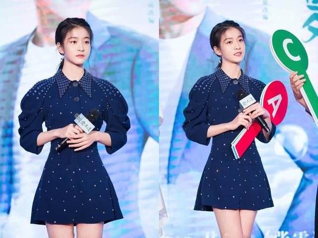 张雪迎裙子穿的太短了，难怪要一直用手挡着，网友：显腿长呗！