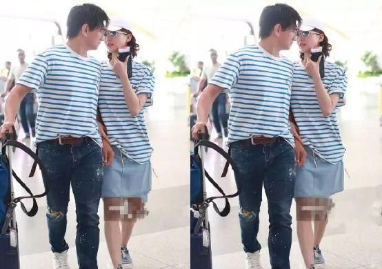 48岁吴奇隆与31岁刘诗诗少见机场秀恩爱，网友：17岁的差距还真大