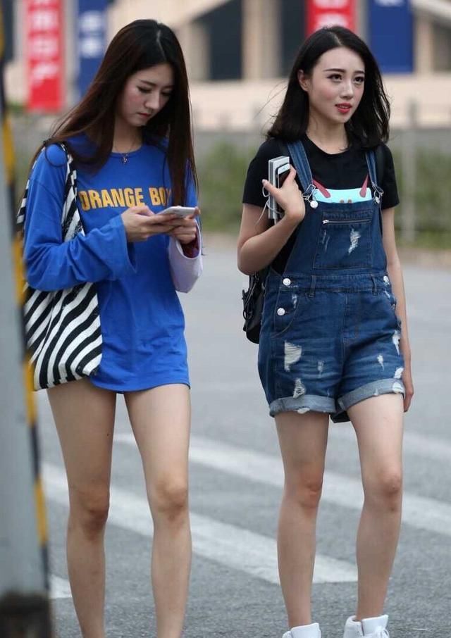 街拍美女高挑挺拔大长腿身形，最后一张看时间长了容易流鼻血!!