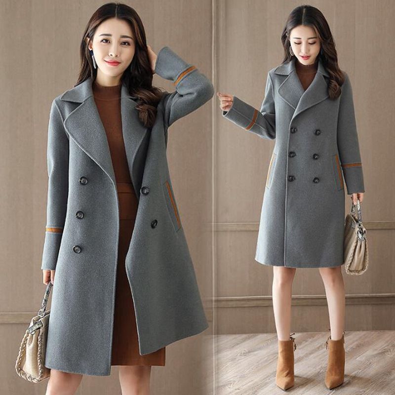 羽绒服不流行了，今年流行呢大衣+小短靴，洋气还不贵