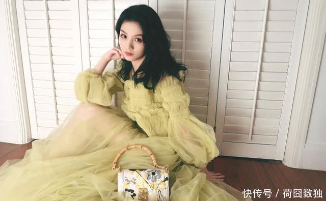  [春夏]春夏穿淡黄色纱裙拍写真，温柔气质太可人，透视薄纱秀美腿