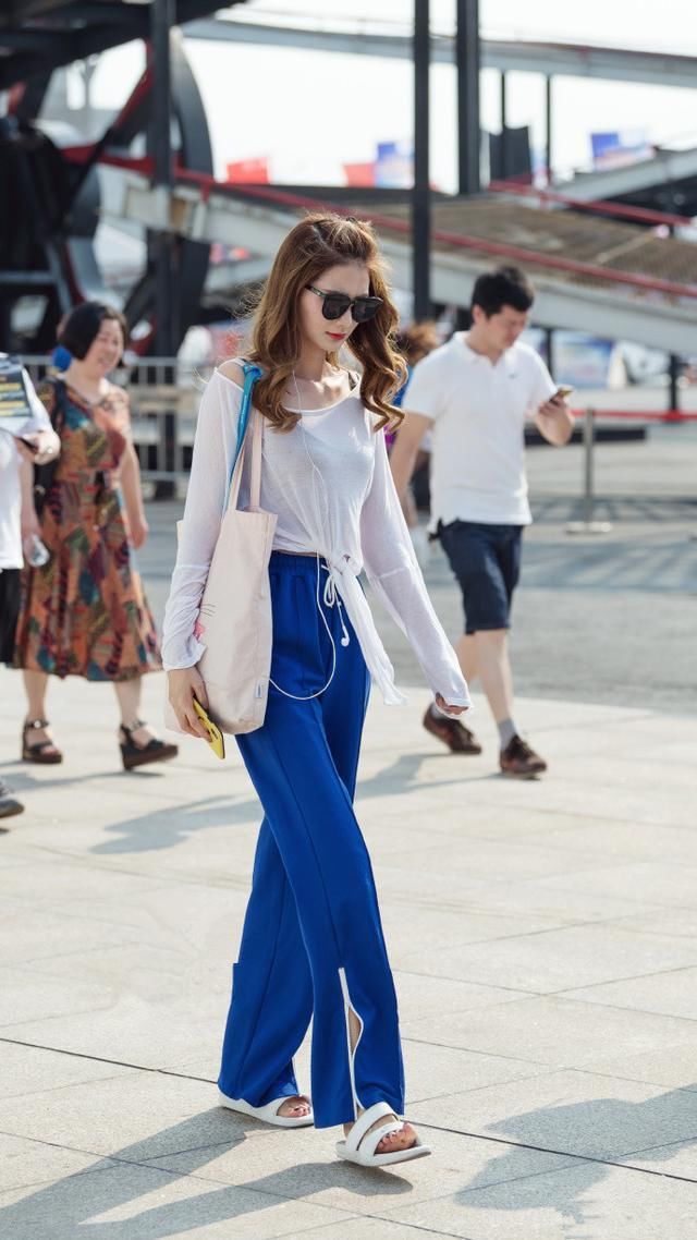 深圳街拍：小姐姐的美腿是吸睛杀手锏 时尚感满满