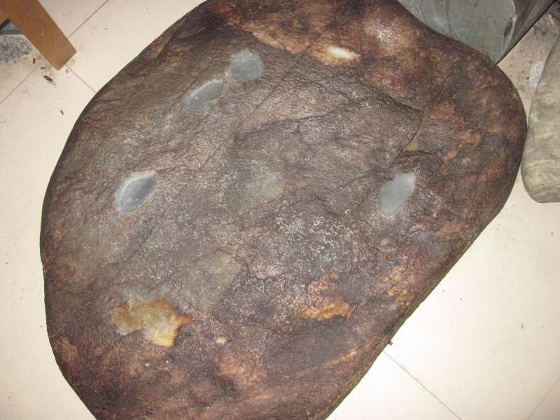  #男子#农村男子在河边捡到块奇石，送去鉴定后，以5000万的价格