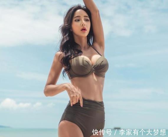 性感动人的泳衣美女,秀出清新迷人的姿态,显得好看时尚又有魅力