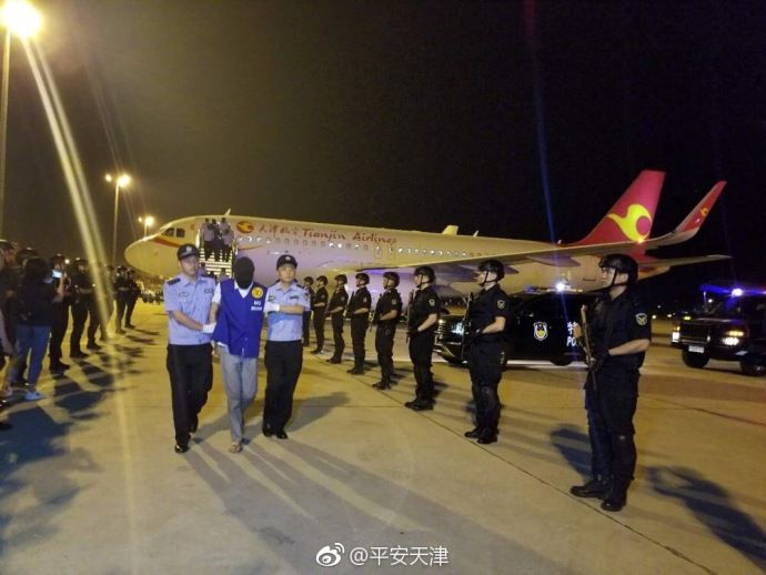 天津公安赴印尼押解105名电信网络诈骗嫌疑人