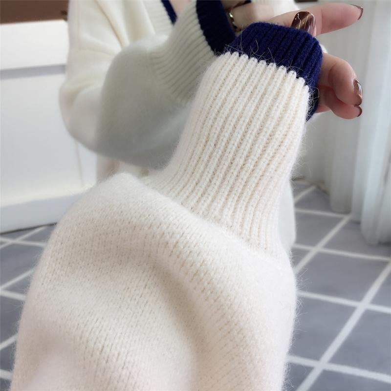 如今的女人个个精于打扮，早秋穿这薄开衫，显瘦美嫩超有气质