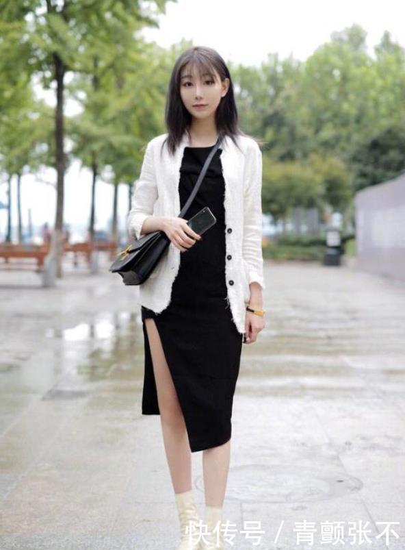 「有型」街拍:面容姣好的美女,紧身背心搭配深色热裤,美丽优雅挺拔有型